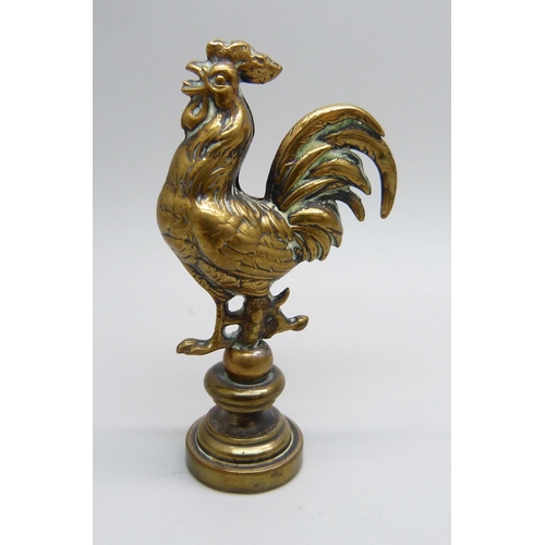 813 - A brass cockerel desk seal