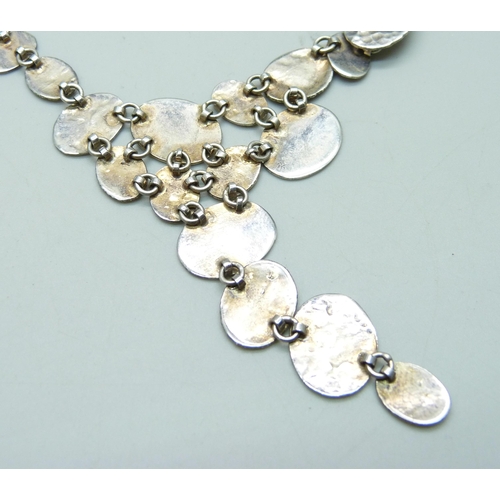 963 - A Chris Lewis silver necklace and earrings set