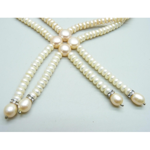 974 - A set of cultured pearls with matching earrings