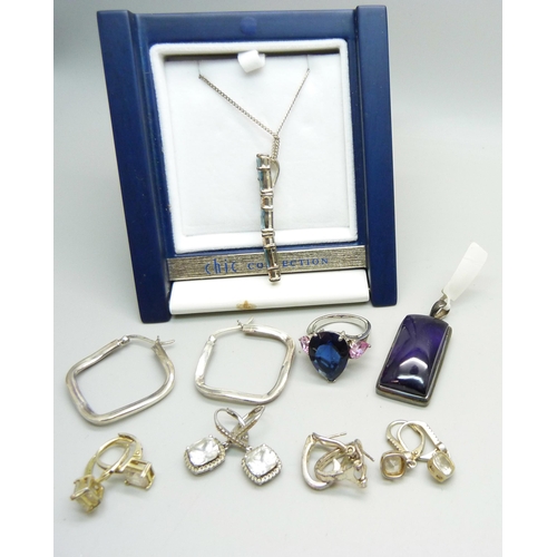 978 - A collection of silver jewellery; earrings, a pendant on a chain, an amethyst pendant and a ring