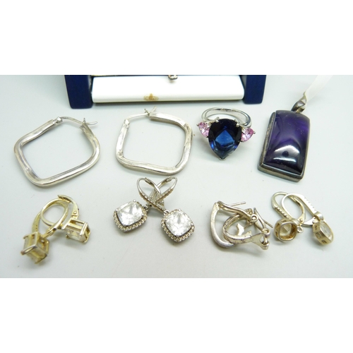 978 - A collection of silver jewellery; earrings, a pendant on a chain, an amethyst pendant and a ring