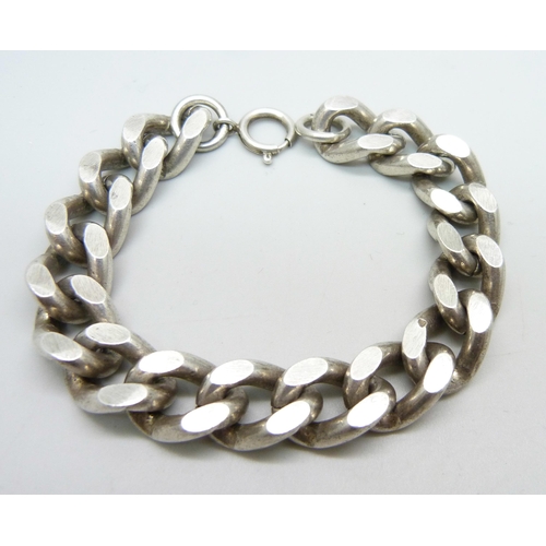 979 - A silver curb link bracelet, 86g