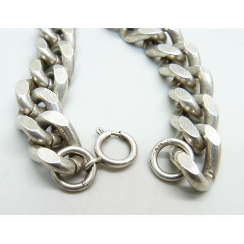 979 - A silver curb link bracelet, 86g