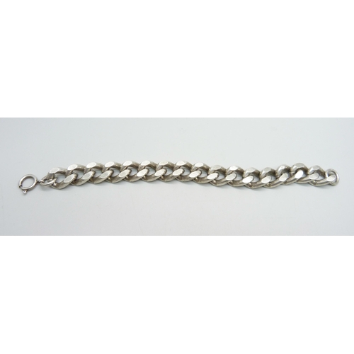 979 - A silver curb link bracelet, 86g