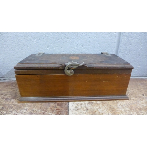 981 - A collection of wooden boxes including a cutlery canteen, a decoupage box together with a letter rac... 