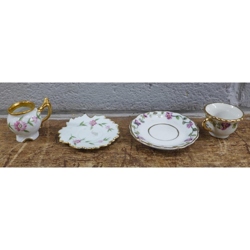 987 - A miniature tea set and a small glass display cabinet **PLEASE NOTE THIS LOT IS NOT ELIGIBLE FOR IN-... 