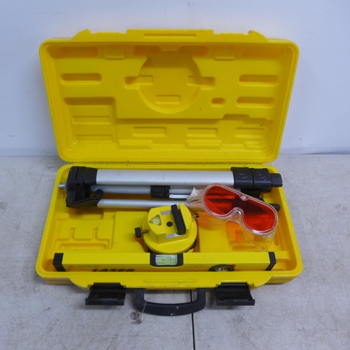 2102 - A laser level, tripod stand, a spirit level and safety goggles