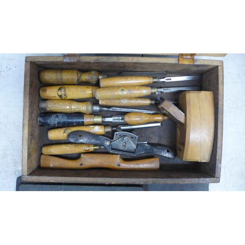 2108 - A quantity of woodworking tools including Marples chisels, spoke shaves, wooden block planes and sha... 