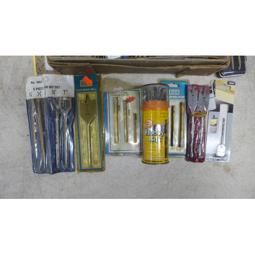 2112 - A set of long bore drill bits, a 7 piece wood drill bit set and one other set of drill bits and a qu... 