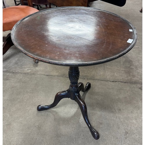 175 - A George III Chippendale style mahogany circular tilt top tripod tea table