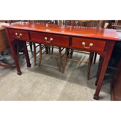 176 - A Victorian style mahogany three drawer serving table