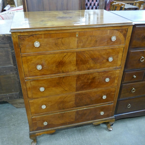 118 - An early 20th Century walnut chest of drawers