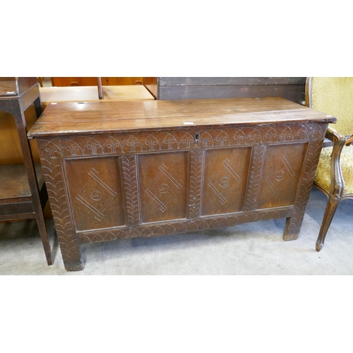 132 - A William III carved oak coffer