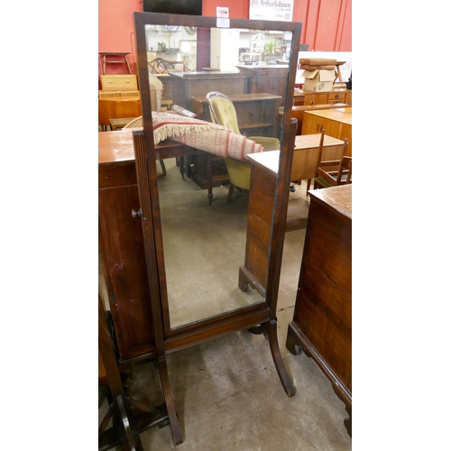 150 - A Regency style mahogany cheval mirror