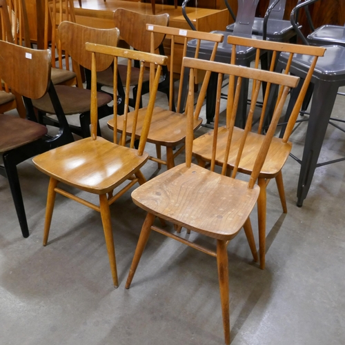 84 - A set of four Ercol Blonde 391 model elm and beech chairs