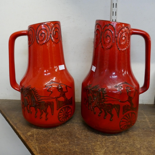 88 - A pair of West German red glazed pottery vases