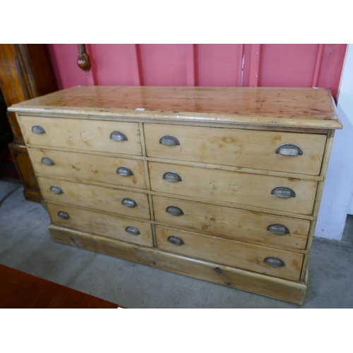 91 - A Victorian pine eight drawers chest