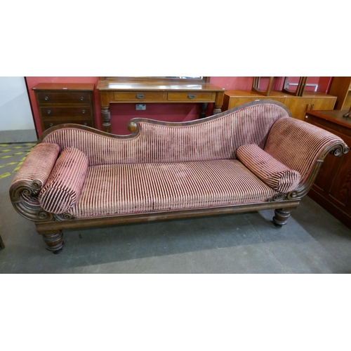 98 - A Regency carved mahogany and fabric upholstered scroll end settee