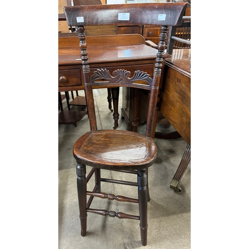 181 - A Victorian child's beech correction chair