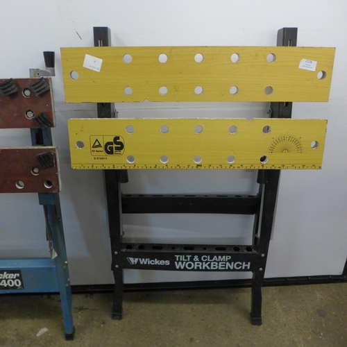 2128 - 2 folding work benches including a Wickes tilt and clamp and Black and Decker workmate 400 and a box... 