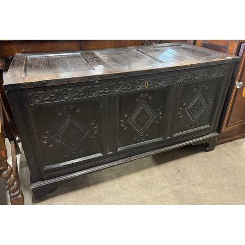 185 - A William III carved oak coffer