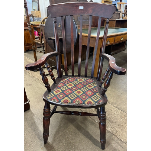 187 - A Victorian style beech farmhouse armchair