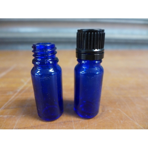 2389 - 2 boxes of blue glass bottles in 10ml and 100ml variety with screw cap lids