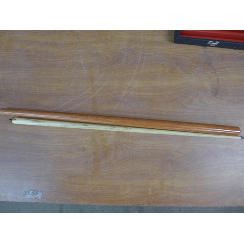 2393 - A two part snooker cue with case