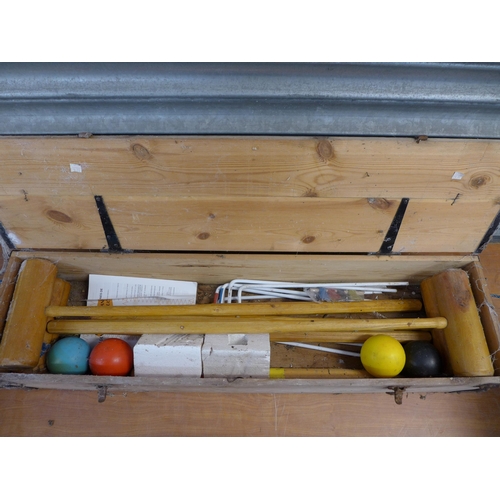 2398 - A County croquet set in a wooden case, a world globe and a Brother 885-412 230V electric sewing mach... 