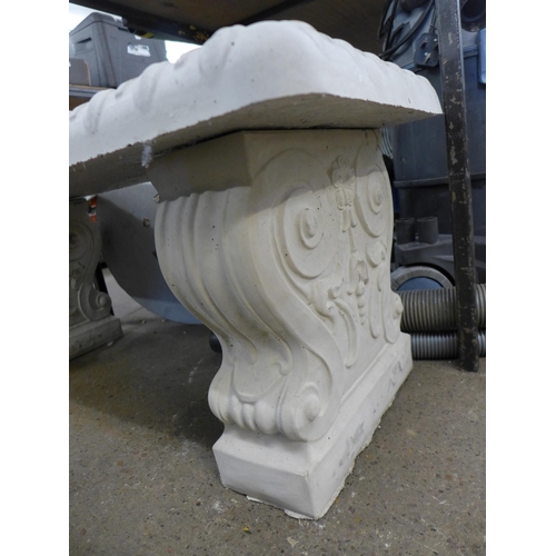 2408 - A stone effect concrete scroll design garden bench