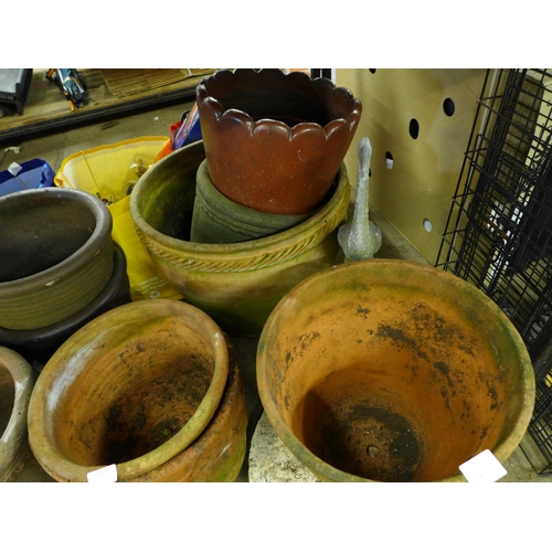 2415 - A large collection of assorted planters including glazed, concrete and terracotta including some vin... 