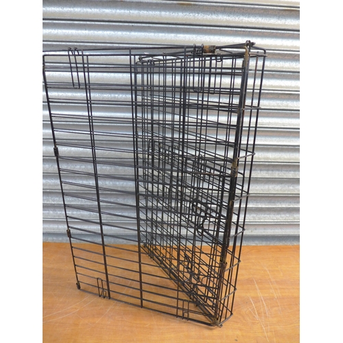 2416 - A collapsible metal pet cage