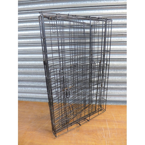 2416 - A collapsible metal pet cage