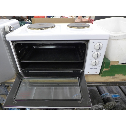 2420 - A Beko MC112W electronic compact cooker and a Morphy Richards mini fridge