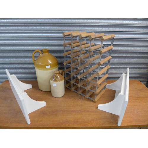 2422 - 2 stoneware jugs with a wood and metal wine rack and 2 white wall shelves