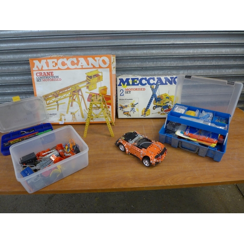 2433 - A large quantity of Meccano including motorized crane set, tool kit and other assorted Meccano parts... 