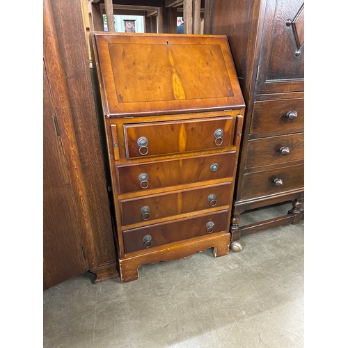 236 - A George III style yew wood bureau