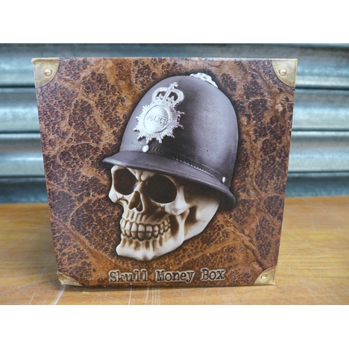 2438 - 6 boxed skull money boxes