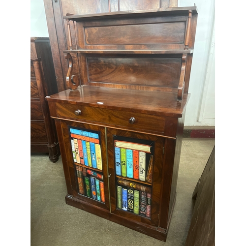 162 - A Regency mahogany chiffonier, with later faux book doors