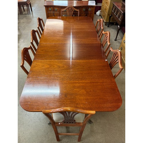 89 - A Regency style ten piece dining suite, comprising; extending pedestal dining table, sideboard and e... 