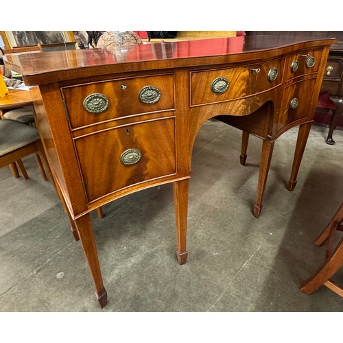 89 - A Regency style ten piece dining suite, comprising; extending pedestal dining table, sideboard and e... 