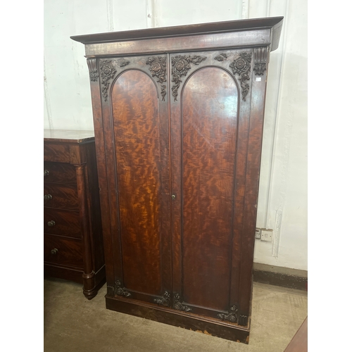 164 - A pair of Victorian carved mahogany linen press and wardrobe