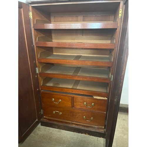 164 - A pair of Victorian carved mahogany linen press and wardrobe