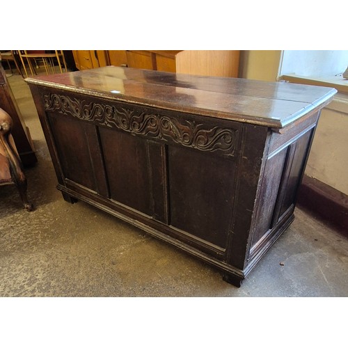 127 - A William III carved oak coffer