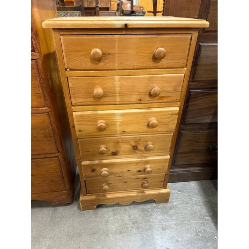 256 - A small pine chest of drawers