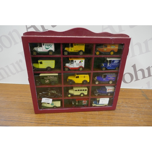 2197 - 15 unboxed collector cars in a wooden display cabinet