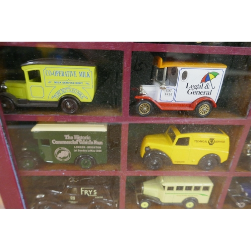 2197 - 15 unboxed collector cars in a wooden display cabinet