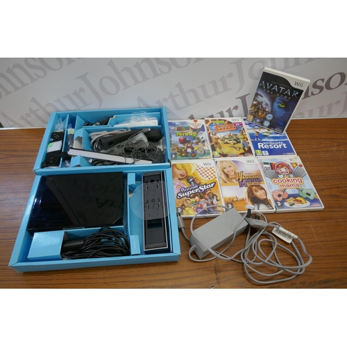 2200 - A Nintendo Wii Sports Resort pack with console and controller and a quantity of Wii games including ... 