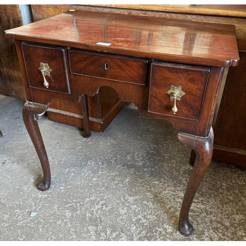 128 - A Queen Anne style walnut lowboy