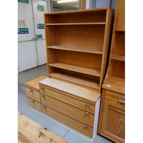 1455 - A bookcase, chest of drawers and bedside chest